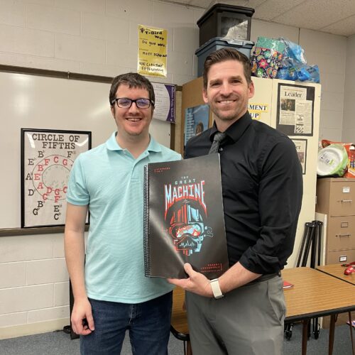 Myself and A. J. Reimer holding his copy of the symphony score