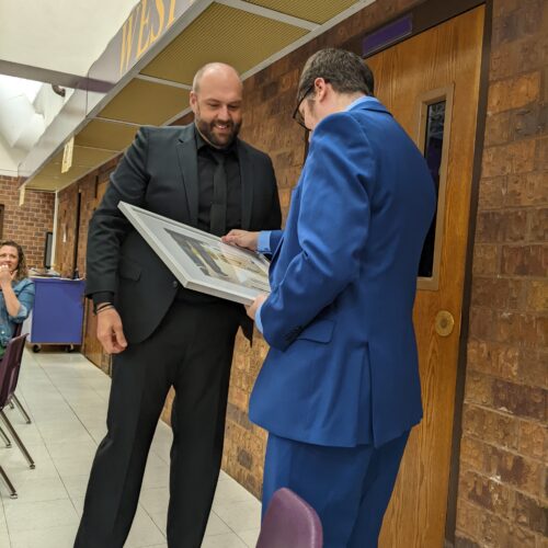 Receiving a frame copy of the poster for that concert